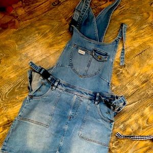 Mumsie baby wearing overall dress